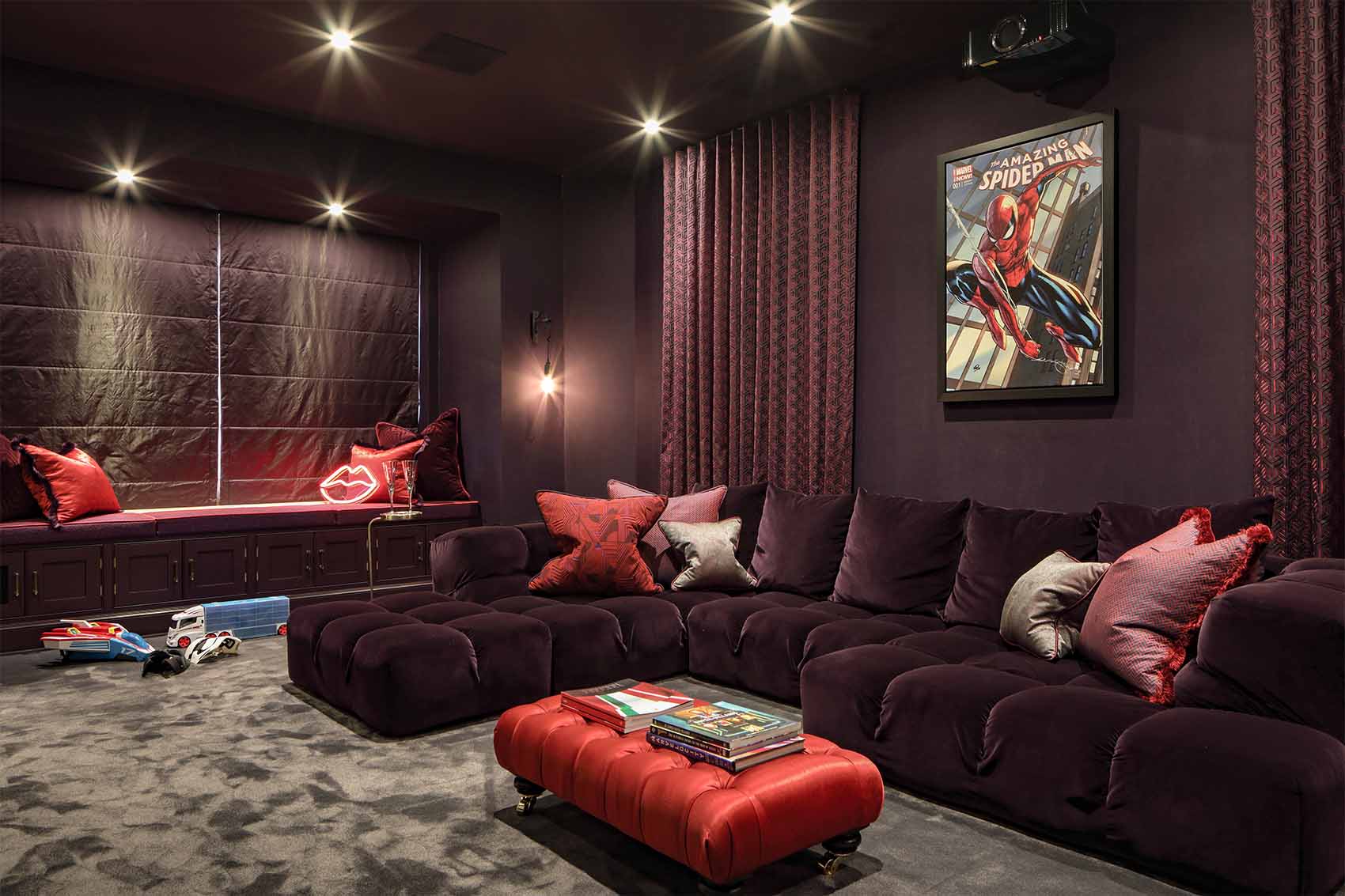 Purple home cinema, aubergine wall paper, velvet L shape sofa, silk carpet, Cotswold retreat
